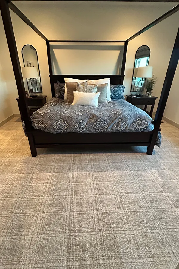 Contemporary poster bed with carpeting 