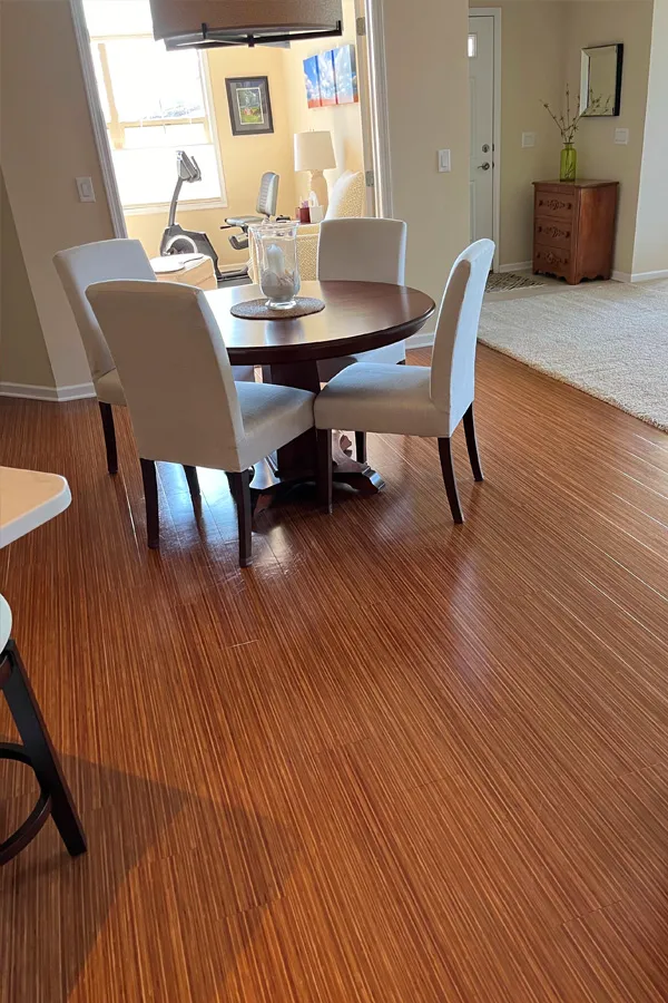 bistro style dining area with wood and carpet divider 