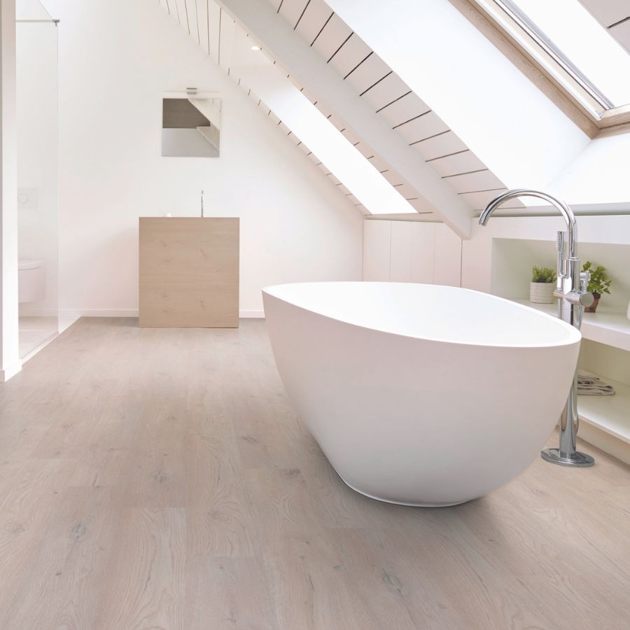 luxury vinyl plank flooring in a bright Iowa bathroom